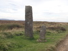 The remains of a cross beside the track.