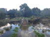 A flooded footbridge.