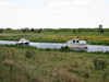 Boats coming up the river.