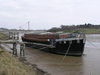 A houseboat moored on the river.