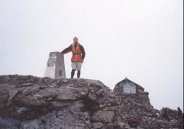 AL27	Myself standing at the trig point on Ben Nevis.