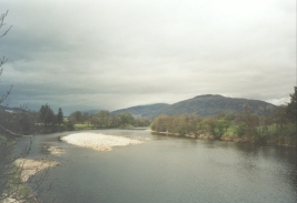 AO23	Looking back towards Fort Willaim from Victoria Bridge down the River Lochy towards Fort William.