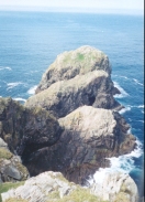 AX05	Looking down on the most north-westerly rocks on the British mainland.