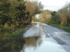 PA230039	Looking north along the flooded road from near Clayhithe.