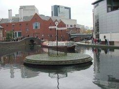 PB110139	A boat on the canal at the junction at Farmers Bridge.