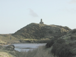 P1190429	The Trig Point on Brown Clee Hill, viewed from the west side of the lake.