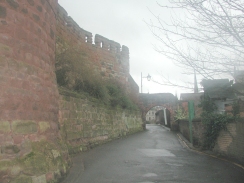 P1200447	The pathway beside the wall of Shrewsbury Castle.