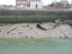 P2230003	Two abandoned boats buried in the mud near Boston Port.