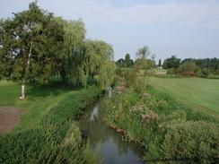 P20028160005	The view north along the River Lark beside the golf course. 