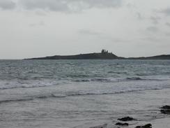 P2002A070040	The view south over Embleton Bay towards Dunstanburgh Castle. 