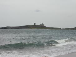 P2002A070042	The view south over Embleton Bay towards Dunstanburgh Castle. 