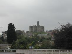 P2002A080043	A distant view of Warkworth Castle. 