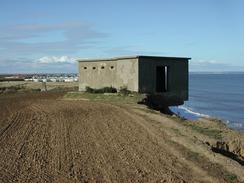 P2002A190045	A building perched precariously over the cliffs at Atwick Sands. 