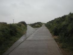 P2002A210014	A fork in the road - one way leads to the sea. 