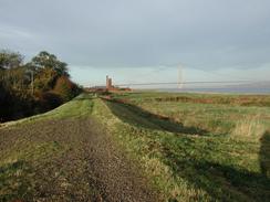 P2002A240007	A view eastwards along the river bank towards an old brick works. 