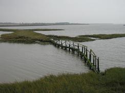 P2002B200014	A bridge across the marshes near Gore Saltings. 