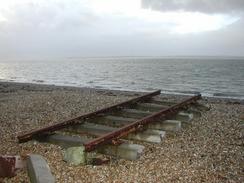 P2002C240006	A piece of railway track on the beach at Browndown. 