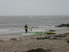 P2002C290078	A windsurfer getting prepared in Christchurch. 