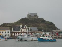 P20032200042	Ilfracombe Harbour, with St Nichols Chapel on the hillside behind. 