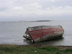 P20035012186	A derelict boat beside the causeway leading to Roa Island.