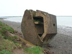 P20035022243	An old pill box on the beach.