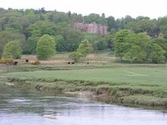 P20035042323	Muncaster Castle viewed across the River Esk.