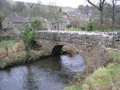 P2003C040165	The bridge over the River Dove in Milldale.