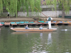 P20054305731	A punt in the mill pond.