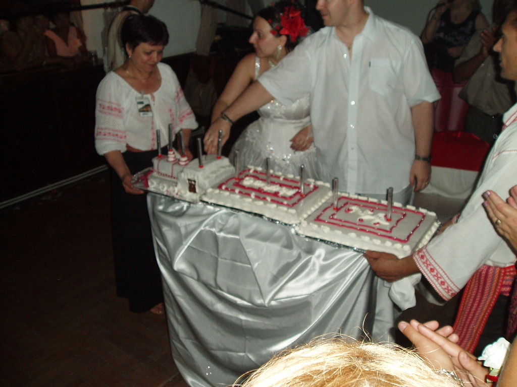 Cutting the cake.