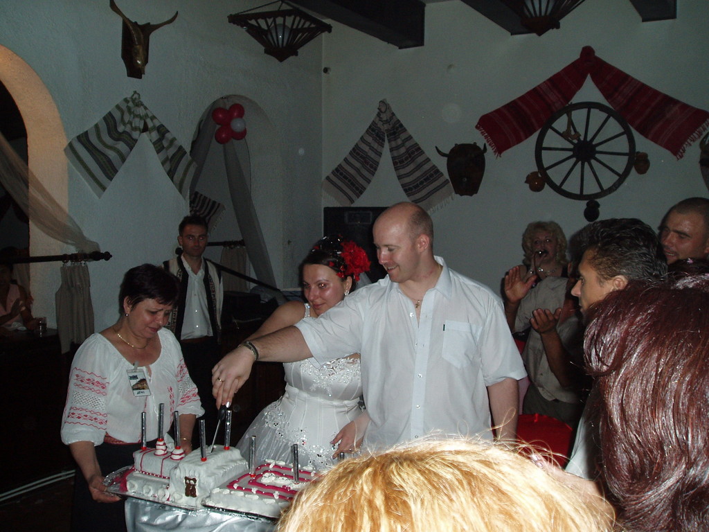 Cutting the cake.