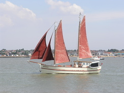 P20067293871	A boat viewed from Mersea Stone.