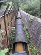 P2007A089395	A conveyor belt on the railway bridge.
