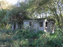 P2007A189507	Old huts by the railway trackbed.