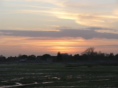 P2007B060679	The sun setting over Langstone.