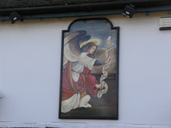 P20081302728	A sign in the side of 'The Angel' pub in Ferndown.