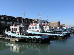 P20082082968	Tugs in the old harbour in Portsmouth.