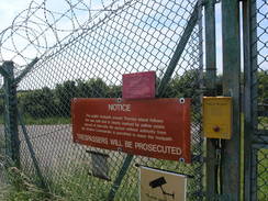 P20086094986	The entrance gate into the MOD property on Thorney Island.