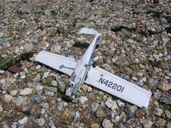 P20086094998	A model plane on the foreshore at Thorney Island.