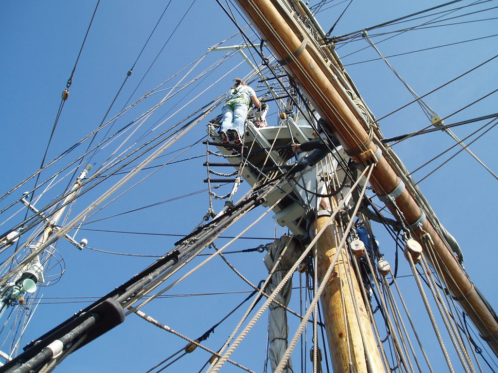 Natasha doing the 'up and over' on the main mast.