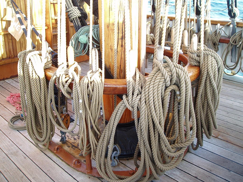 Pegs beside a mast.