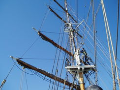 P20089235477	Someone climbing the fore mast.