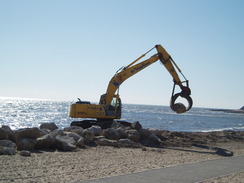 P20103080049	A digger on the beach.