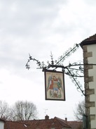 P20104280073	An ornate sign on The Angel Inn, Hindon.