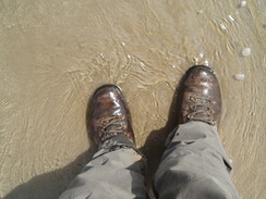 P20105130125	Treating my boots to a dip in the sea.