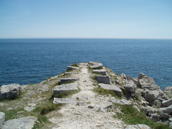 P20105220103	Lines of stone blocks leading to the sea.