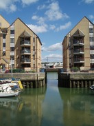 P20107280072	New houses beside the River Adur.