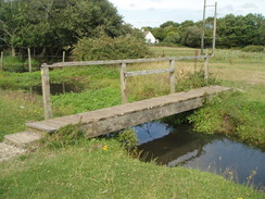 P20108030101	A bridge over a stream on Winkton Common.