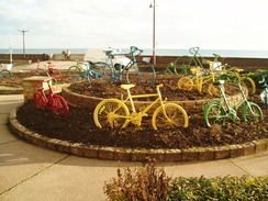 P2010B060192	Colourful sculptures on the roundabout in Seaton.