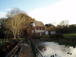 P2010C091130	The footbridge leading to Throop Mill.