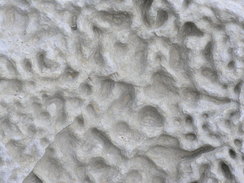 P20111021274	Eroded stone.